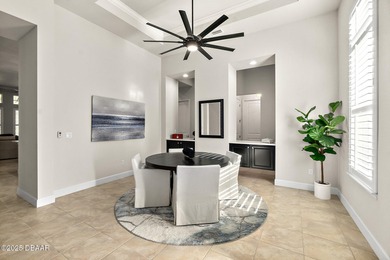 Nestled inside the guard gated, golf-cart-friendly community of on Plantation Bay Golf and Country Club in Florida - for sale on GolfHomes.com, golf home, golf lot