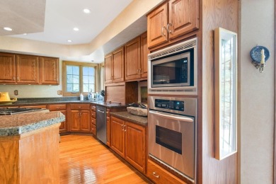 Tucked away in the heart of Muirfield Village, this stately on Muirfield Village Golf Club in Ohio - for sale on GolfHomes.com, golf home, golf lot