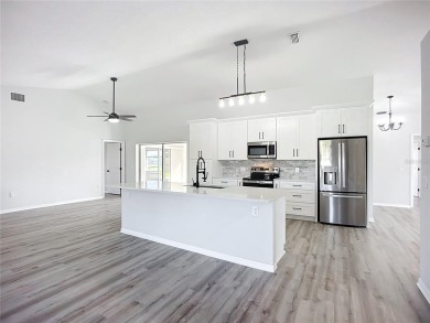 Completely transformed in 2024, this stunning 4-bedroom on Pinemoor West Golf Club in Florida - for sale on GolfHomes.com, golf home, golf lot