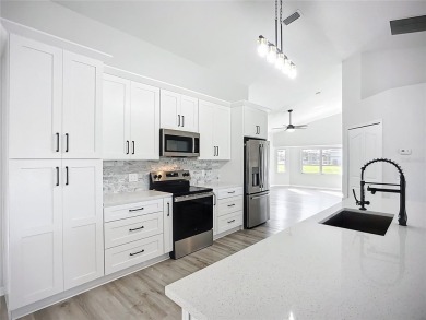Completely transformed in 2024, this stunning 4-bedroom on Pinemoor West Golf Club in Florida - for sale on GolfHomes.com, golf home, golf lot