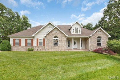Welcome to resort-style living in this lovely custom ranch with on Raintree Country Club in Missouri - for sale on GolfHomes.com, golf home, golf lot