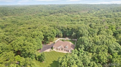 Welcome to resort-style living in this lovely custom ranch with on Raintree Country Club in Missouri - for sale on GolfHomes.com, golf home, golf lot