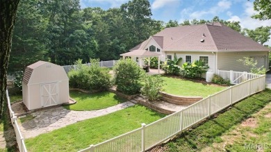 Welcome to resort-style living in this lovely custom ranch with on Raintree Country Club in Missouri - for sale on GolfHomes.com, golf home, golf lot