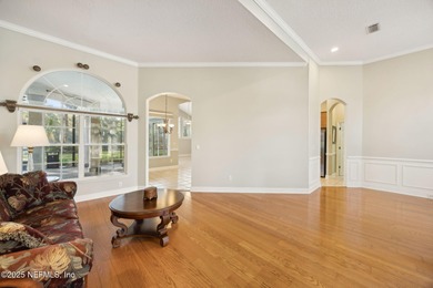 Discover an elegant retreat nestled in sought-after North on Golf Club At North Hampton in Florida - for sale on GolfHomes.com, golf home, golf lot