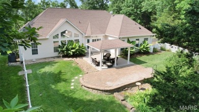 Welcome to resort-style living in this lovely custom ranch with on Raintree Country Club in Missouri - for sale on GolfHomes.com, golf home, golf lot