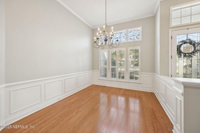 Discover an elegant retreat nestled in sought-after North on Golf Club At North Hampton in Florida - for sale on GolfHomes.com, golf home, golf lot