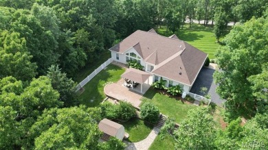Welcome to resort-style living in this lovely custom ranch with on Raintree Country Club in Missouri - for sale on GolfHomes.com, golf home, golf lot