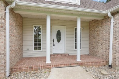 Welcome to resort-style living in this lovely custom ranch with on Raintree Country Club in Missouri - for sale on GolfHomes.com, golf home, golf lot