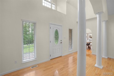 Welcome to resort-style living in this lovely custom ranch with on Raintree Country Club in Missouri - for sale on GolfHomes.com, golf home, golf lot