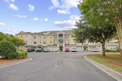 Enjoy low-maintenance resort living in this spacious 3-bedroom on Barefoot Resort and Golf Club  in South Carolina - for sale on GolfHomes.com, golf home, golf lot