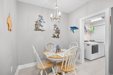 Enjoy low-maintenance resort living in this spacious 3-bedroom on Barefoot Resort and Golf Club  in South Carolina - for sale on GolfHomes.com, golf home, golf lot