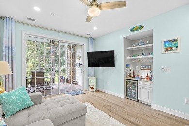 Enjoy low-maintenance resort living in this spacious 3-bedroom on Barefoot Resort and Golf Club  in South Carolina - for sale on GolfHomes.com, golf home, golf lot