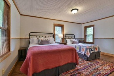 Charming Historic Cabin w/ Year-Round Mountain Views looking on Black Mountain Golf Course in North Carolina - for sale on GolfHomes.com, golf home, golf lot