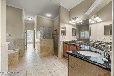 Nestled in the prestigious Black Creek at Eagle Harbor community on Eagle Harbor Golf Club in Florida - for sale on GolfHomes.com, golf home, golf lot