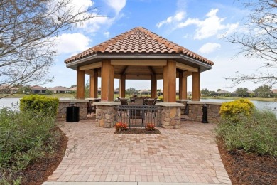 Welcome to 4825 Benito Ct - Where Thoughtful Living Meets on Esplanade Golf and Country at Lakewood Ranch in Florida - for sale on GolfHomes.com, golf home, golf lot