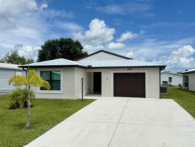 Rare to find new CBS home, Metal Roof, Bright Split floor plan on Spanish Lakes Fairways in Florida - for sale on GolfHomes.com, golf home, golf lot