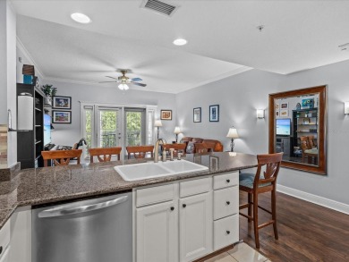 Tucked inside the gates of Reunion Resort, this beautifully on Reunion Resort Golf Course in Florida - for sale on GolfHomes.com, golf home, golf lot
