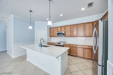 Experience the best of Florida living in this beautiful on Gateway Golf and Country Club in Florida - for sale on GolfHomes.com, golf home, golf lot