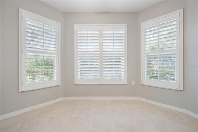 MOVE-IN READY and METICULOUSLY MAINTAINED home in the highly on Tampa Bay Golf and Country Club in Florida - for sale on GolfHomes.com, golf home, golf lot