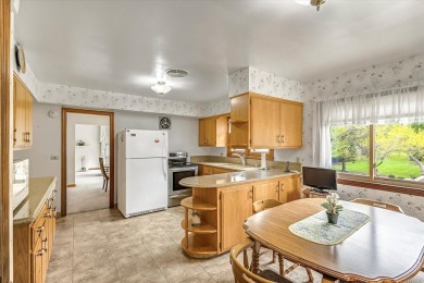 Charming midcentury brick colonial on coveted Lake Dr offers on Grant Park Golf Course in Wisconsin - for sale on GolfHomes.com, golf home, golf lot