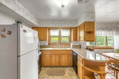 Charming midcentury brick colonial on coveted Lake Dr offers on Grant Park Golf Course in Wisconsin - for sale on GolfHomes.com, golf home, golf lot
