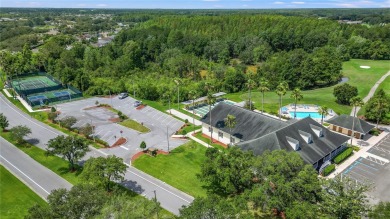 MOVE-IN READY and METICULOUSLY MAINTAINED home in the highly on Tampa Bay Golf and Country Club in Florida - for sale on GolfHomes.com, golf home, golf lot