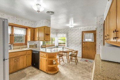Charming midcentury brick colonial on coveted Lake Dr offers on Grant Park Golf Course in Wisconsin - for sale on GolfHomes.com, golf home, golf lot