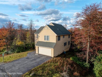 Discover luxury living in this stunning 4-bedroom home located on Pinecrest Lake Golf and Country Club in Pennsylvania - for sale on GolfHomes.com, golf home, golf lot