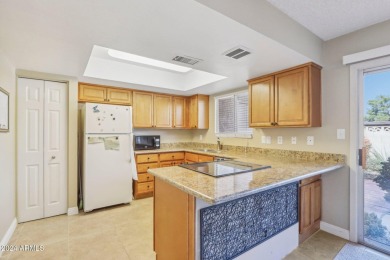 This beautifully updated 2-bedroom, 2-bath townhome is located on Bellaire Golf Club in Arizona - for sale on GolfHomes.com, golf home, golf lot