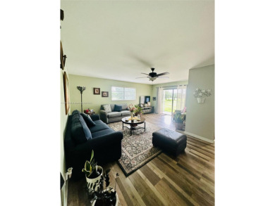 Beautifully maintained 2/2 corner unit, features a comfortable on Davie Golf Club in Florida - for sale on GolfHomes.com, golf home, golf lot