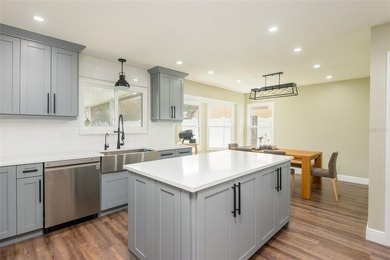 Beautifully renovated, move-in ready 3BR/2.5BA two-story home on Carrollwood Country Club in Florida - for sale on GolfHomes.com, golf home, golf lot