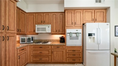 This upgraded and well-maintained home offers 3 bedrooms and 2 on Oasis Country Club in California - for sale on GolfHomes.com, golf home, golf lot