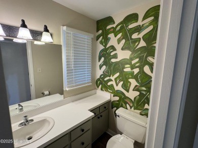 Welcome to easy living in this beautifully maintained 2-bedroom on Wilson Country Club in North Carolina - for sale on GolfHomes.com, golf home, golf lot