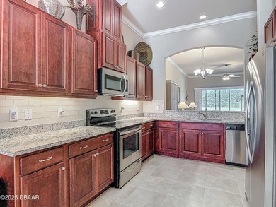 Immaculate, 3 bedroom, 2 bathroom home with water views and on Halifax Plantation Golf Club in Florida - for sale on GolfHomes.com, golf home, golf lot