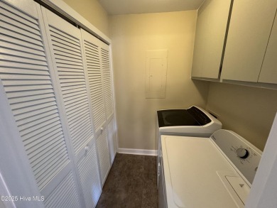 Welcome to easy living in this beautifully maintained 2-bedroom on Wilson Country Club in North Carolina - for sale on GolfHomes.com, golf home, golf lot