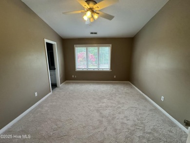 Welcome to easy living in this beautifully maintained 2-bedroom on Wilson Country Club in North Carolina - for sale on GolfHomes.com, golf home, golf lot