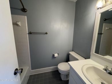 Welcome to easy living in this beautifully maintained 2-bedroom on Wilson Country Club in North Carolina - for sale on GolfHomes.com, golf home, golf lot