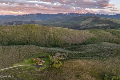 Discover the epitome of secluded luxury, a breathtaking on Red Sky Ranch and Golf Club in Colorado - for sale on GolfHomes.com, golf home, golf lot
