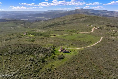 Discover the epitome of secluded luxury, a breathtaking on Red Sky Ranch and Golf Club in Colorado - for sale on GolfHomes.com, golf home, golf lot