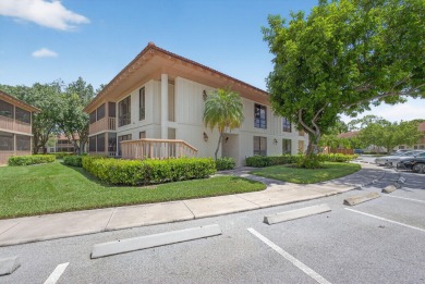 Enjoy effortless living in this beautifully remodeled 2-bedroom on PGA National Golf Club in Florida - for sale on GolfHomes.com, golf home, golf lot