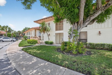 Enjoy effortless living in this beautifully remodeled 2-bedroom on PGA National Golf Club in Florida - for sale on GolfHomes.com, golf home, golf lot