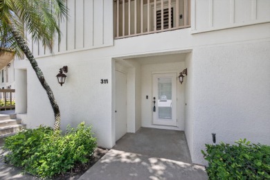 Enjoy effortless living in this beautifully remodeled 2-bedroom on PGA National Golf Club in Florida - for sale on GolfHomes.com, golf home, golf lot