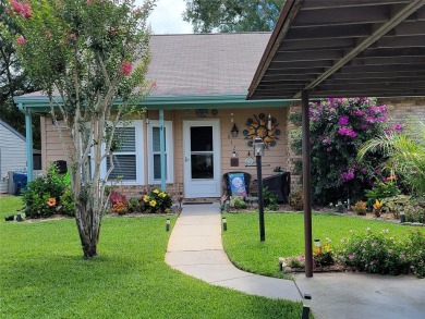 One or more photo(s) has been virtually staged. Multiple photos on The Ridge Manor Oaks Golf and Country Club in Florida - for sale on GolfHomes.com, golf home, golf lot