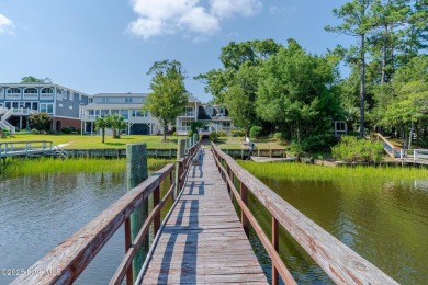 Discover the ultimate coastal living experience on this prime on Founders Club At St. James Plantation in North Carolina - for sale on GolfHomes.com, golf home, golf lot