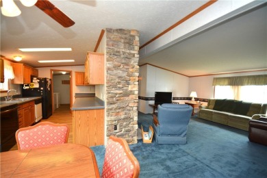 Well-maintained 3BR/2BA double-wide in a fantastic community on Winding Creek Executive Course in New York - for sale on GolfHomes.com, golf home, golf lot