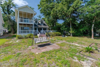 Discover the ultimate coastal living experience on this prime on Founders Club At St. James Plantation in North Carolina - for sale on GolfHomes.com, golf home, golf lot