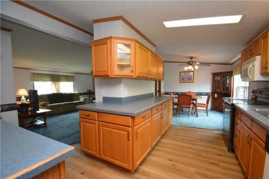Well-maintained 3BR/2BA double-wide in a fantastic community on Winding Creek Executive Course in New York - for sale on GolfHomes.com, golf home, golf lot