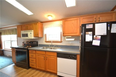 Well-maintained 3BR/2BA double-wide in a fantastic community on Winding Creek Executive Course in New York - for sale on GolfHomes.com, golf home, golf lot