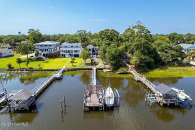 Discover the ultimate coastal living experience on this prime on Founders Club At St. James Plantation in North Carolina - for sale on GolfHomes.com, golf home, golf lot