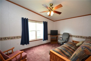 Well-maintained 3BR/2BA double-wide in a fantastic community on Winding Creek Executive Course in New York - for sale on GolfHomes.com, golf home, golf lot